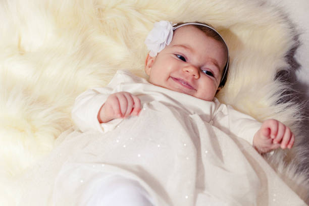 Baby wearing a soft cotton dress comfortably.