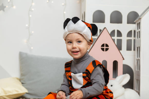 Baby wearing a comfy costume at a costume party.