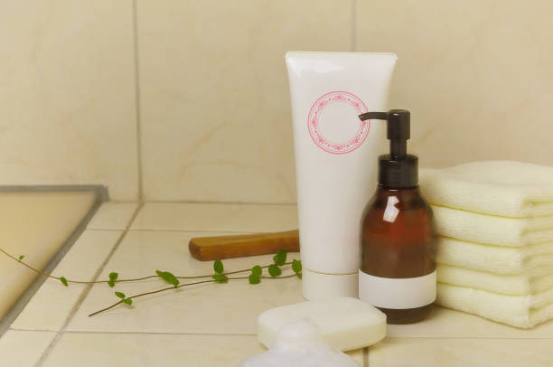 Stretch marks cream and skincare products on a bathroom counter