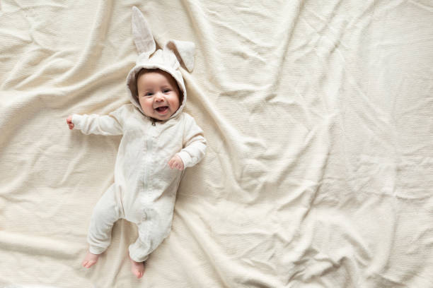 Smiling baby wearing an easy-to-wear costume.