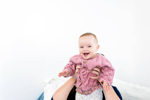 Baby styled in a cozy cardigan and cotton leggings, perfect for everyday comfort