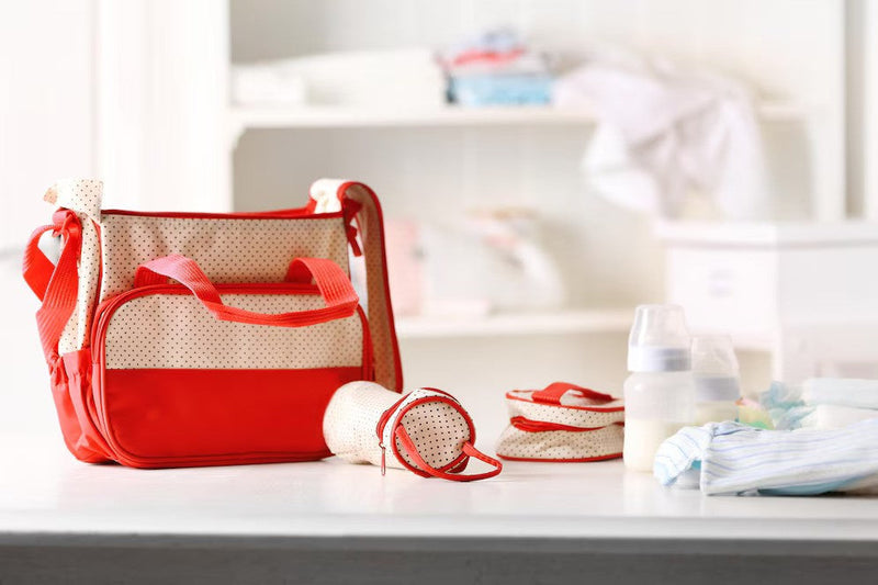 Nursing and feeding essentials for babies, including bottles, breast pumps, and nursing pillows