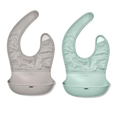 Two baby bibs, one gray and one mint green, on a white background.