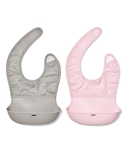 Two baby bibs, one gray and one pink, on a white background