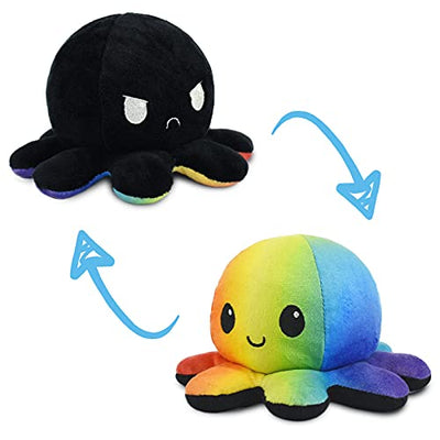 Black plush octopus transforming into a rainbow-colored plush octopus with arrows indicating the transformation.