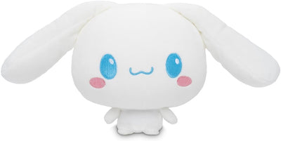 White plush toy with blue eyes and pink cheeks on a white background