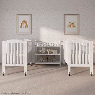 Dream On Me 2-in-1 Folding Portable Compact Mini Baby Crib in White, GreenGuard Gold & BSA, US Patented Flat Folding System, Locking Wheels,1″ Mattress Pad, Space-Saving Quck Fold Easy Storage