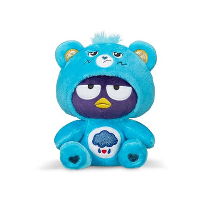 Blue plush toy with a sad expression on a white background