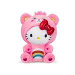 Pink plush toy with a red bow on a white background