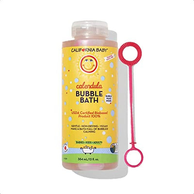 California Baby Calendula Bubble Bath bottle with a pink bubble wand on a white background