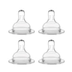 Four clear baby bottle nipples on a white background