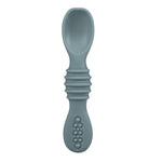 Blue silicone spoon on a white background