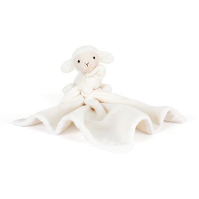 White plush lamb toy with matching blanket on a white background