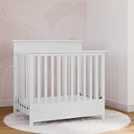 Storkcraft Petal 4-in-1 Convertible Mini Crib (White) – GREENGUARD Gold Certified, Converts to Daybed and Twin-Size Bed, Bonus 2.75-inch Mini Crib Mattress Included, Ideal for Small Spaces