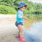 green sprouts Girls' Snap Reusable Absorbent Swimsuit Diaper, Navy Flamingos, 18 M