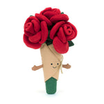Toy rose in a cone with a face on a white background