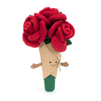Toy rose in a cone with a face on a white background