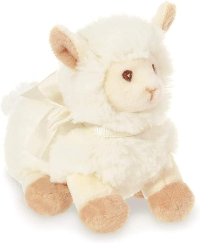 Plush lamb toy on a white background