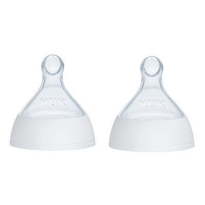 Two NUK baby bottle nipples on a white background