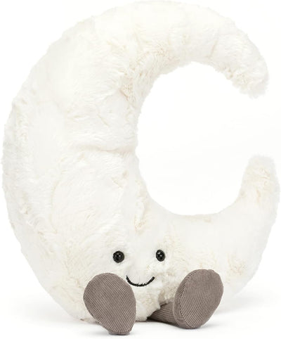 White plush toy shaped like a crescent moon with a smiling face on a white background
