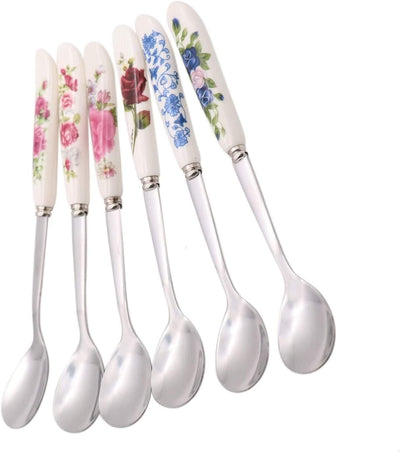 Set of six floral-patterned spoons on a white background