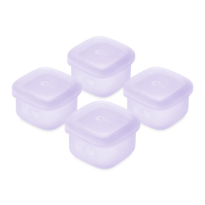 Set of five purple silicone food containers on a white background