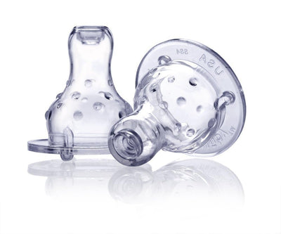 Two clear baby pacifiers on a white background