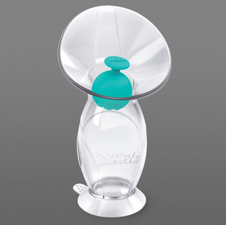 Nuby breast pump on a gray background