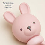 Itzy Ritzy Silicone Rattle Toy – Soothing Teething Toy with Soft Jingle Sound & Easy-Grip Textured Handle - for Ages 3 Months and Up (Bunny)