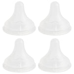 Four white silicone bottle nipples on a white background