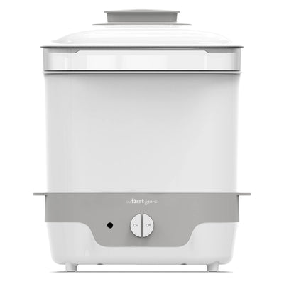 White and gray baby bottle sterilizer with 'The First Years' branding on a white background