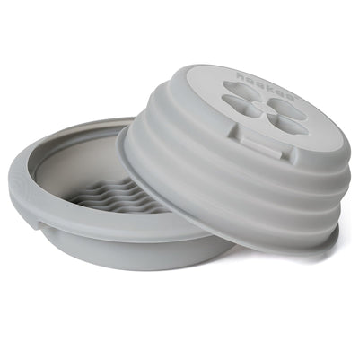 Gray silicone lid with a textured surface on a white background