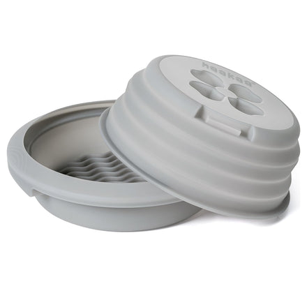 Gray silicone lid with a textured surface on a white background