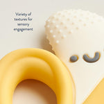 Itzy Ritzy Banana-Shaped Baby Teether with Handles – Silicone Teether for Babies with Easy-Grab Handles and Textured, Teethable Surfaces - Baby Teething Toy for 3 Months & Up (Banana)