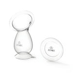 Clear breast pump with Zomee logo on a white background