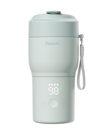 Light blue portable紫外线消毒器 with digital display on a white background