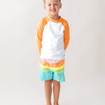RUGGEDBUTTS Boys UPF50+ Sun Protection Striped Color Block Swim Trunks - Pale Rainbow Stripe, 2T