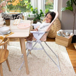 Ingenuity Sun Valley Compact Folding Baby High Chair, Food-Grade Safe Plate, Safety Harness, for Ages 6 Months and Up, Unisex - Pink