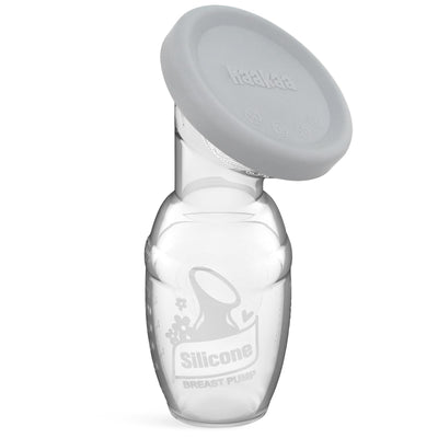 Handheld silicone breast pump with a gray cover on a white background