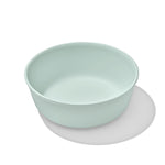 Light green ceramic bowl on a white background