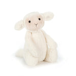 Plush toy lamb on a white background