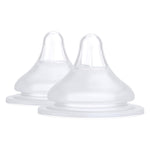 Two clear baby bottle nipples on a white background