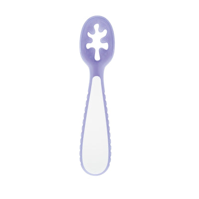 Purple spoon with a white handle on a white background