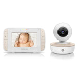 Motorola baby monitor with screen displaying a baby and camera on a white background