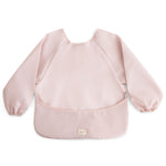 mushie Long Sleeve Baby Bib | Mess Free & Waterproof Fabric for Toddlers | Adjustable Fit for Ages 6-24 Months (Blush)