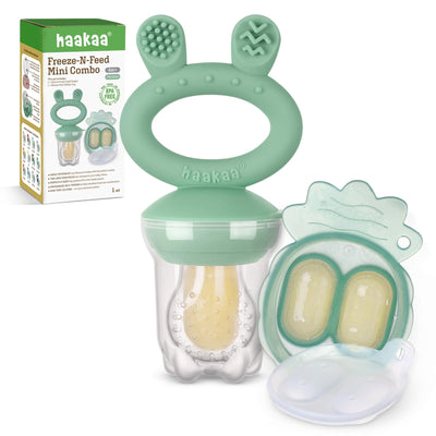 Green baby teether and feeder set with packaging on a white background