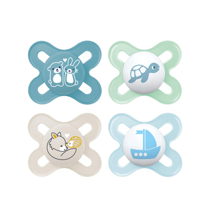 Four baby pacifiers with different designs on a white background