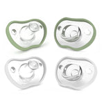 Four baby pacifiers with green and clear design on a white background