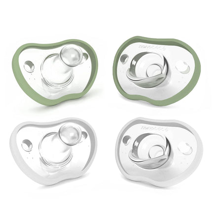 Four baby pacifiers with green and clear design on a white background