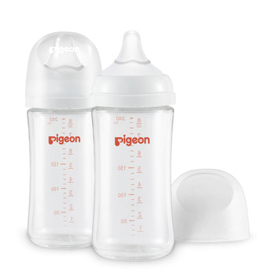 Two clear baby bottles with 'pigeon' branding on a white background